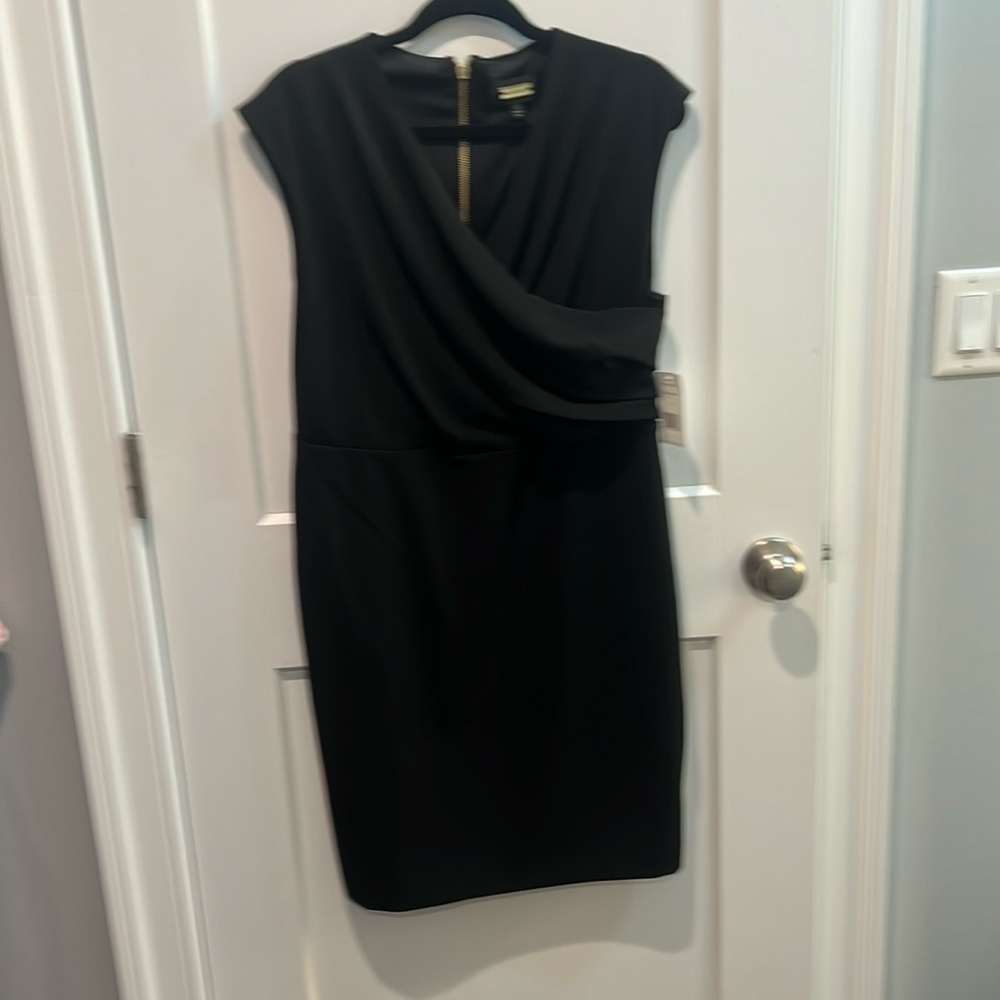 Classic black dress with gold back zipper